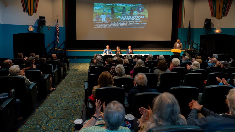 Community members gather at Dietrich Theater for Waverly's history event.